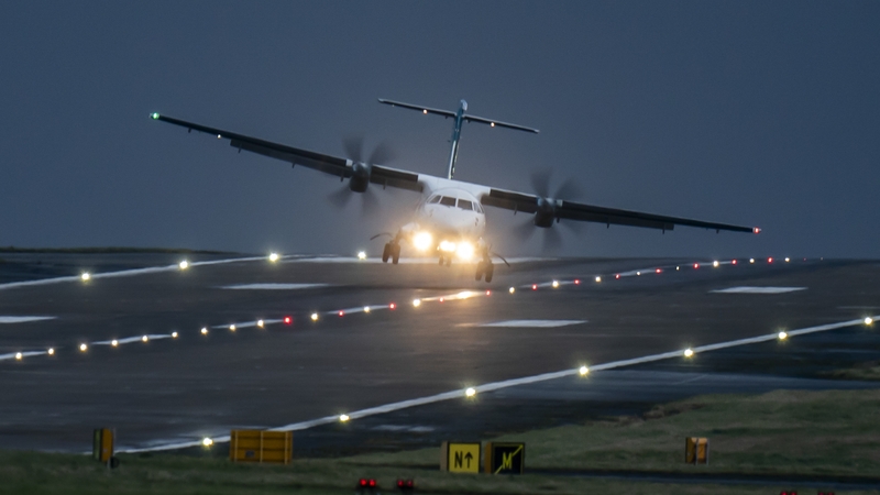 An aircraft lands at Leeds Bradford Airport during Storm Pia