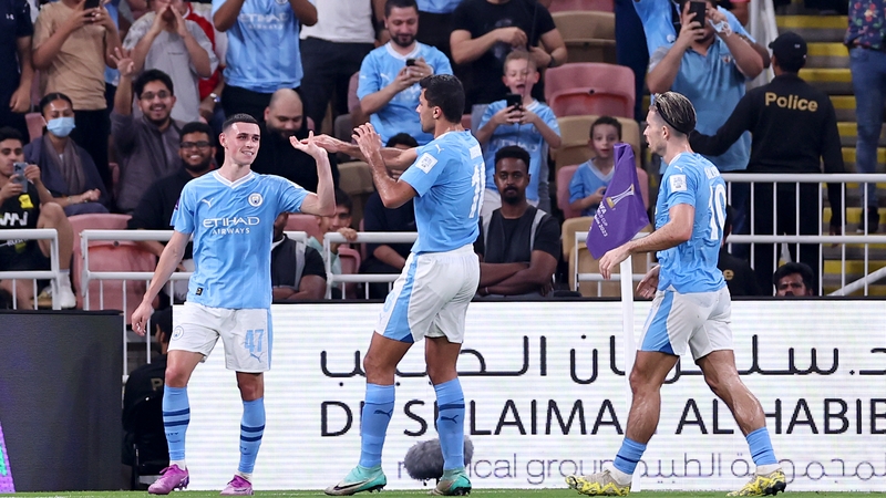 Phil Foden, Rodri and Jack Grealish celebrate after the own goal from Fluminense's Nino