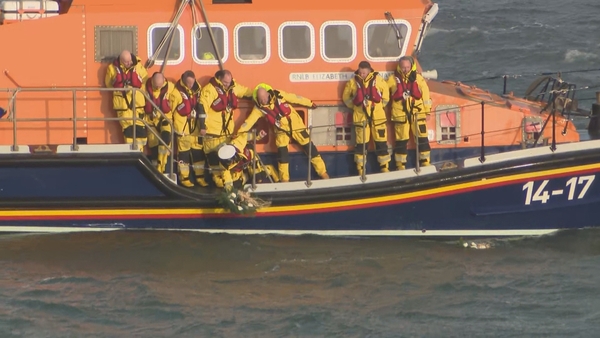 The lifeboat crews were joined by colleagues from the Irish Coast Guard who formed a guard of honour as wreaths were brought out of the lighthouse