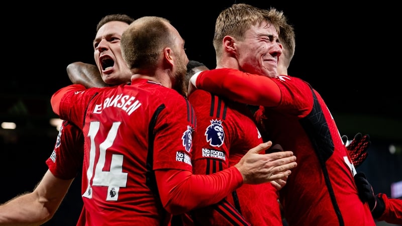 Rasmus Hojlund is congratulated by United team-mates after finding the net against Aston Villa