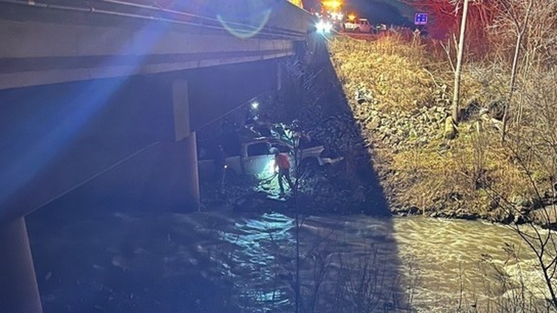 The man had been pinned in the wreckage of his vehicle under a motorway (Pics: Indiana State Police Facebook)