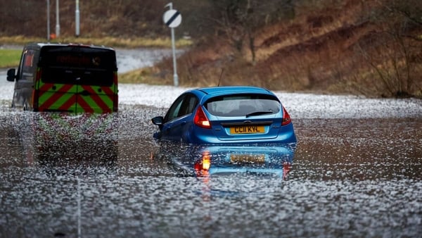 Vehicles stranded by floodwater in Old Kilpatrick, Scotland