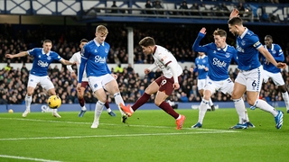Manchester City's Julian Alvarez has a shot saved