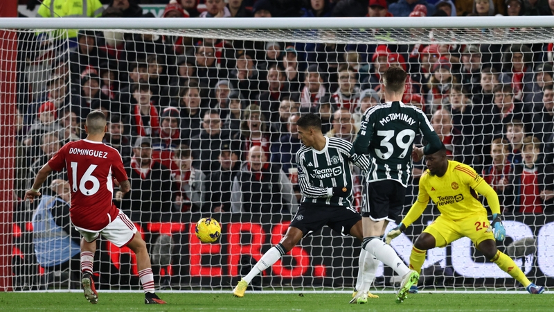 Nicolas Dominguez (L) scores the opening goal for Forest