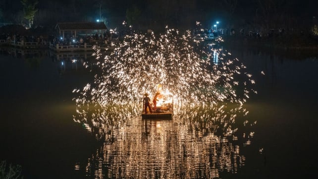 A performance of the striking iron flower takes place in Hefei, East China to welcome 2024