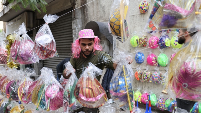 A street vendor sells festive party decorations for New Year's Eve in Beirut, Lebanon