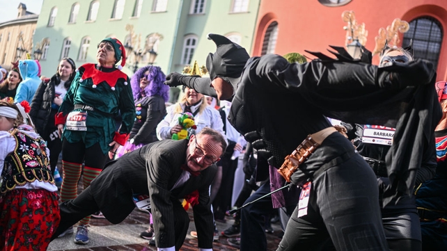 Hundreds have dressed in costumers in the Krakow Satirical New Year's Eve Run in Poland