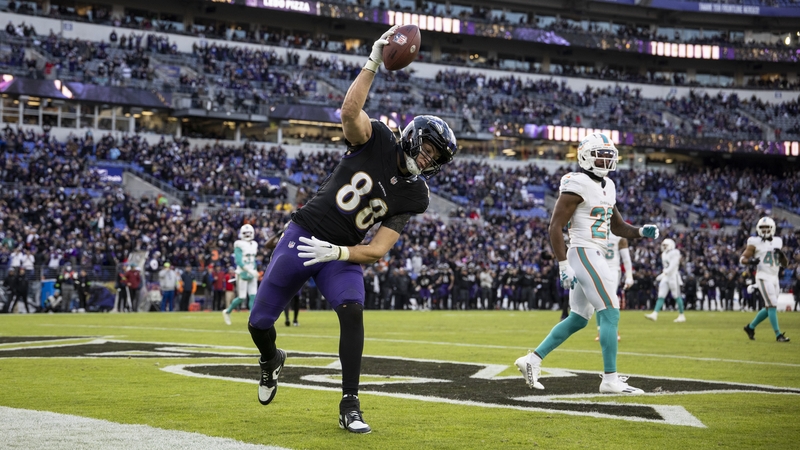 Charlie Kolar of the Baltimore Ravens celebrates after scoring a touchdown
