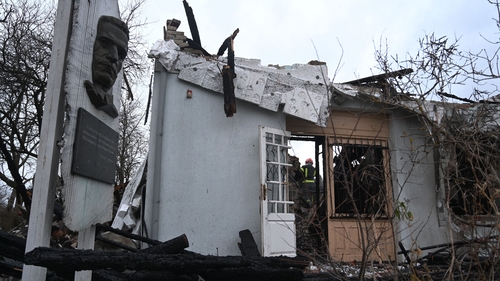 Ukrainian firefighters inspect the destroyed Shukhevych Museum after a drone attack in Bilogorshchethe, Lviv