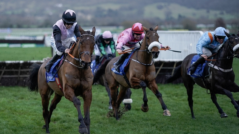 Rachael Blackmore and Bob Olinger (l) pulls clear after the last for victory