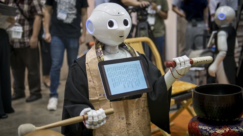 Pepper human-shaped robot while celebrating the Buddhist funeral rites to the Tokyo Int'l Funeral & Cemetery Show in Tokyo August 23, 2017. Getty Images