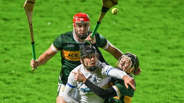 Brian Looby of Waterford is tackled by Kerry's Shane Conway
