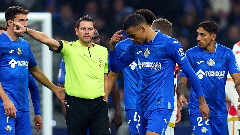 Mason Greenwood (C) is given his marching orders