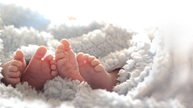 The tiny difference means the family will celebrate one of the girls' birthdays on New Year's Eve and the other one on New Year's Day (Stock image)