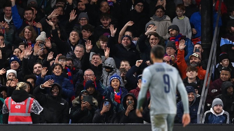 Dominic Calvert-Lewin is waved off the pitch by Crystal Palace fans following his red card