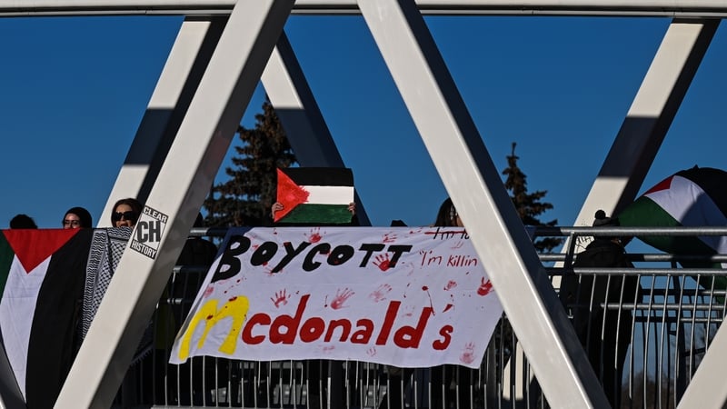 Members of the local Palestinian diaspora hold 'Boycott McDonald's' banner during a recent protest in Edmonton in Canada
