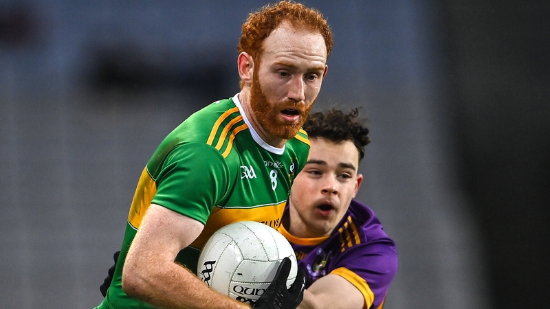Conor Glass of Watty Graham's Glen in action against Luke Ward of Kilmacud Crokes during last January's All-Ireland final between the clubs