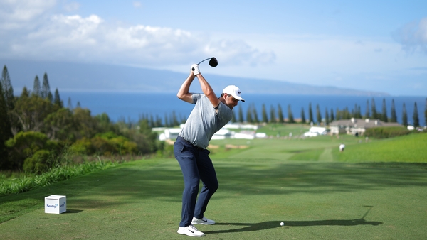 Scottie Scheffler driving off from the 18th tee at the Plantation Course