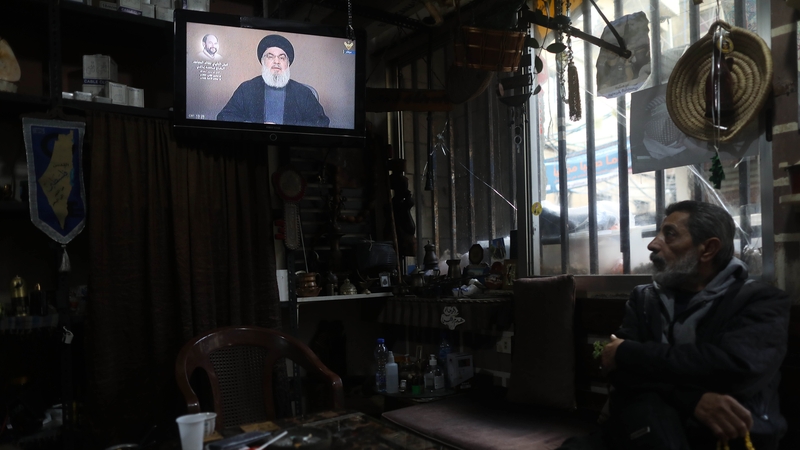 A televisions in Al-Burj Palestinian refugee camp transmits a speech by Hezbollah leader Hassan Nasrallah