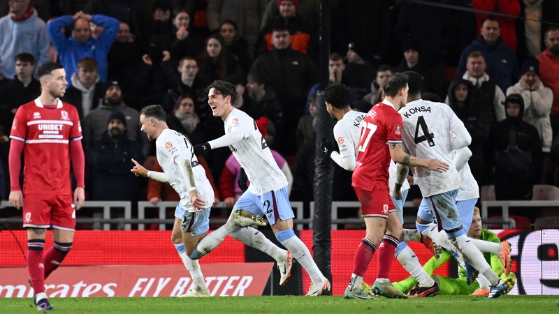 Matty Cash [second left] celebrates his winner