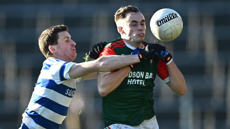 Conor Hand of St Brigid's (r) in action against Johnny O'Regan