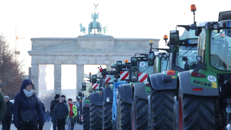 Farmers began gathering at the Brandenburg Gate landmark yesterday, the heart of the government quarter in Berlin