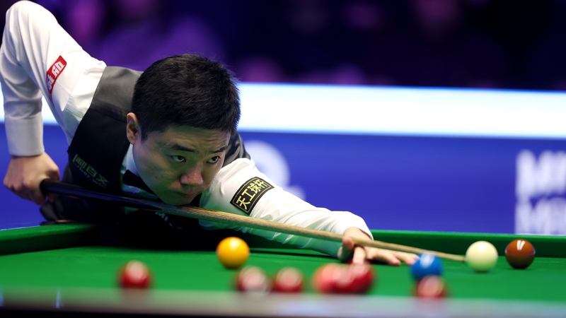Ding Junhui in action during his first-round match against Ronnie O'Sullivan at the Masters