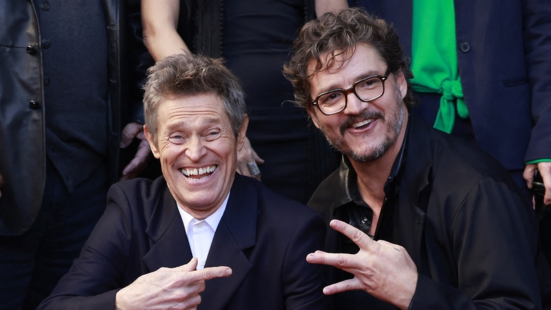 Pedro Pascal poses with Willem Dafoe during the ceremony honoring him with a Hollywood Walk of Fame star in Hollywood
