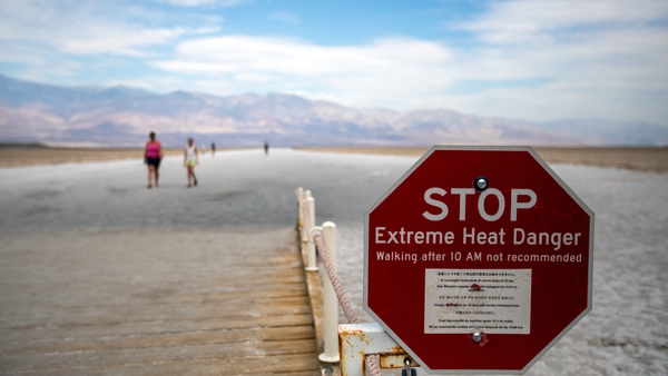 An extreme heat danger sign at Badwater Basin, Death Valley National Park in California on 17 July 2023