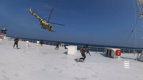 Yemen's Houthi fighters' take over a ship in the Red Sea on 2 November