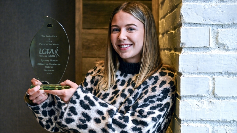 Lynsey Noone holding the Croke Park/LGFA Player of the Month award for December 2023