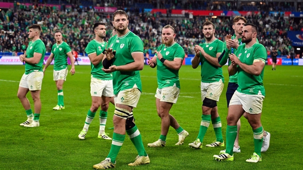 Dejected Ireland players applaud the fans after the loss to New Zealand