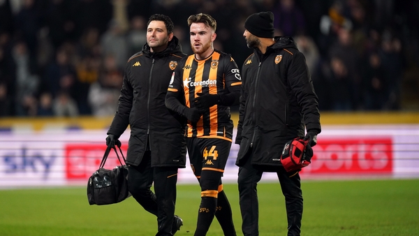 Connolly is walked off the pitch