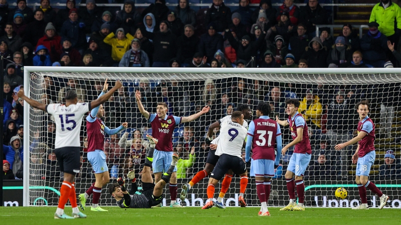 Burnley players protest after Luton's late equaliser