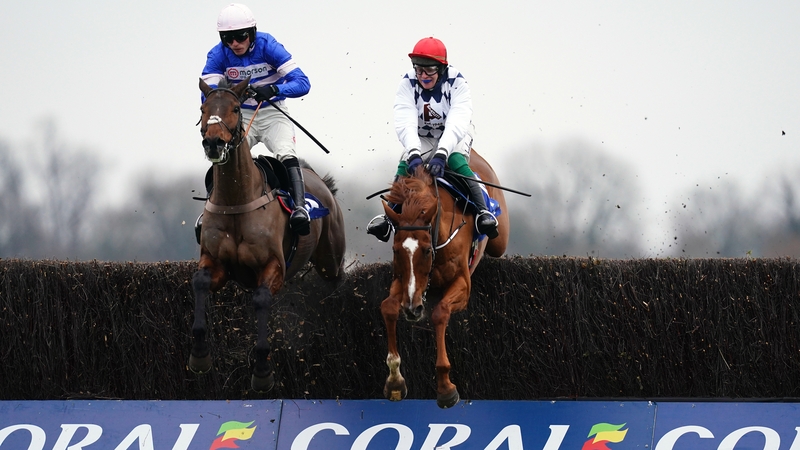 Banbridge (right) and Pic D'Orhy jump the last at Kempton