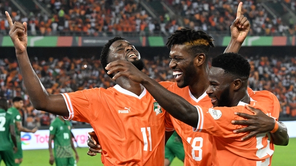 L-R: Jean-Philippe Krasso, Ibrahim Sangare and Jonathan Bamba celebrate Ivory Coast's second goal