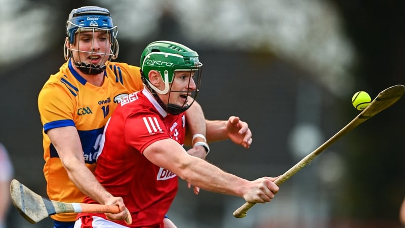 Cork's Robbie O'Flynn is pursued by Keelan Hartigan of Clare