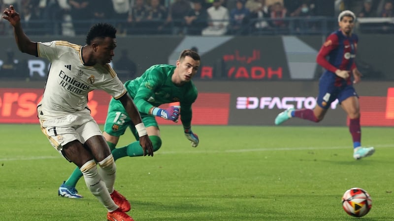 Vinicius Junior scores his second goal against Barcelona