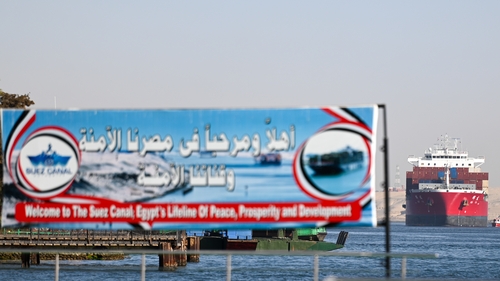 A ship transits the Suez Canal towards the Red Sea