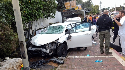 Police attend the scene in the city of Raanana
