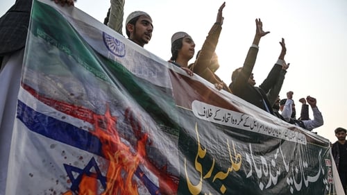 Youth activists in Pakistan shout slogans during a protest against an Iranian air strike earlier this week