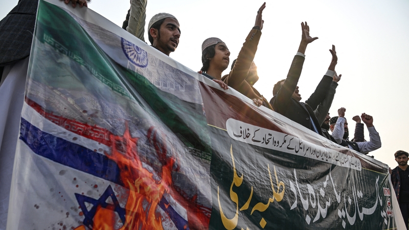 Youth activists in Pakistan shout slogans during a protest against an Iranian air strike earlier this week