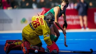 Ireland's Hannah McLoughlin is thwarted by Spain goalkeeper Clara Perez in the penalty shootout