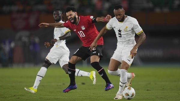 Mohamed Salah reacts after suffering an apparent hamstring injury