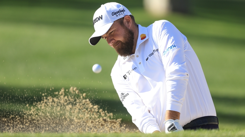 Shane Lowry plays a bunker shot at the 15th at La Quinta in California