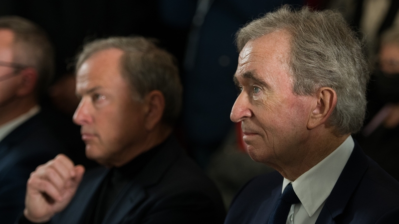 Bernard Arnault, chairman of LVMH Moet Hennessy Louis Vuitton (right) and Michael Burke, CEO and chairman of LVMH Fashion Group