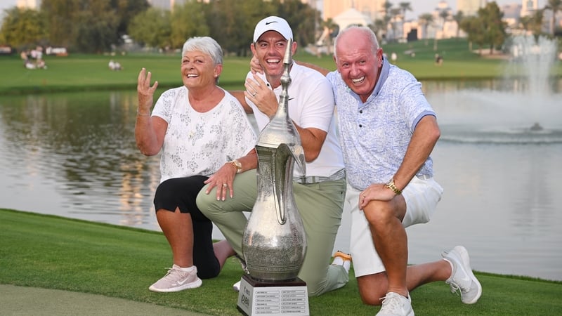 Rory McIlroy celebrates his victory with parents Rosie and Gerry
