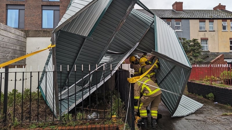 Firefighters said they made an area safe after high winds lifted a shed 6m into the air over a wall (Pic: Dublin Fire Brigade)