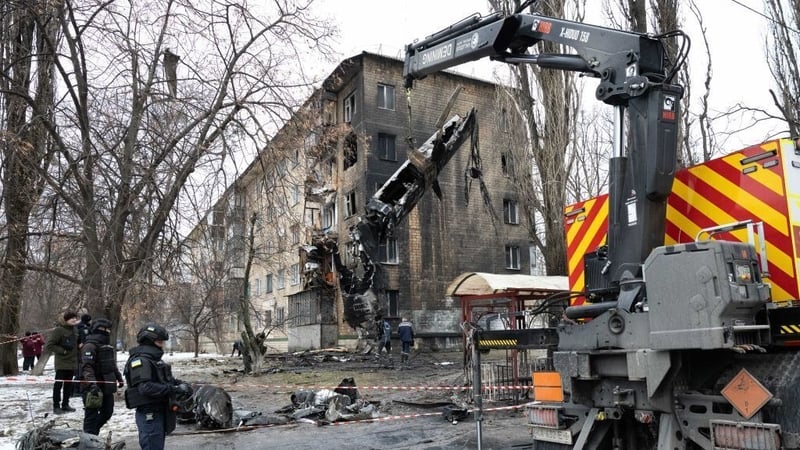 Fragments of a Russian missile are removed after falling in the Sviatoshynskyi district in Kyiv