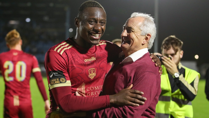 Galway United manager John Caulfield with Francely Lomboto
